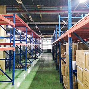 What is the role of pallet racks in warehouses?